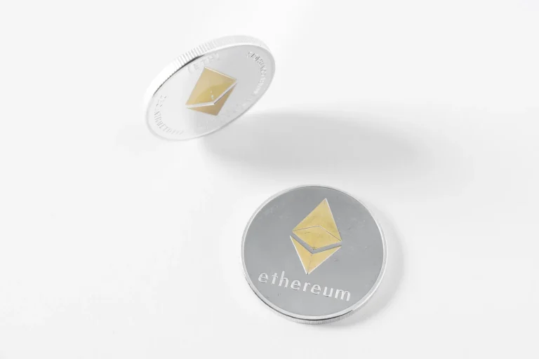 Two silver Ethereum coins on a white background, representing the Ethereum layer 1 that both Arbitrum and zkSync settle to