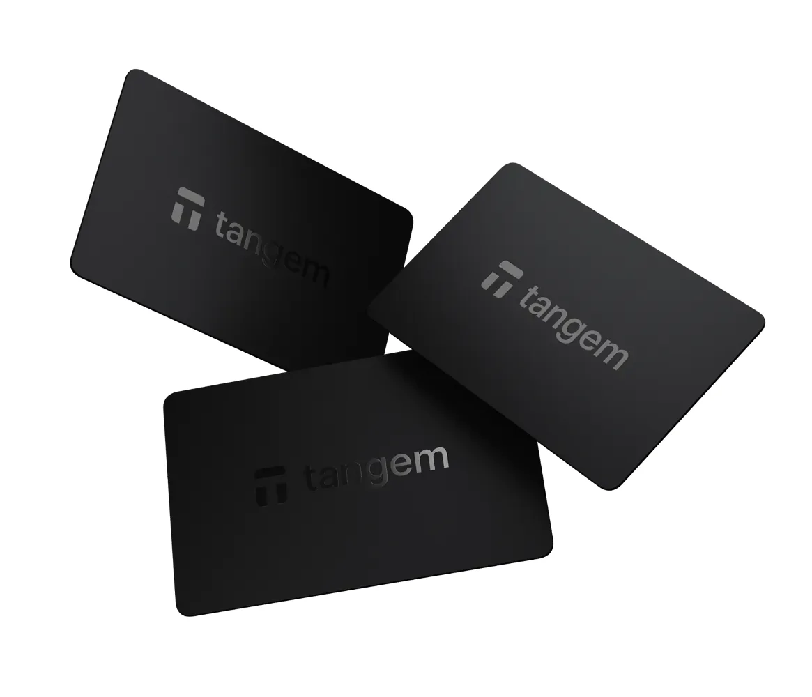 Three black Tangem Wallet cards from the 3-card set, which work as backups of one another