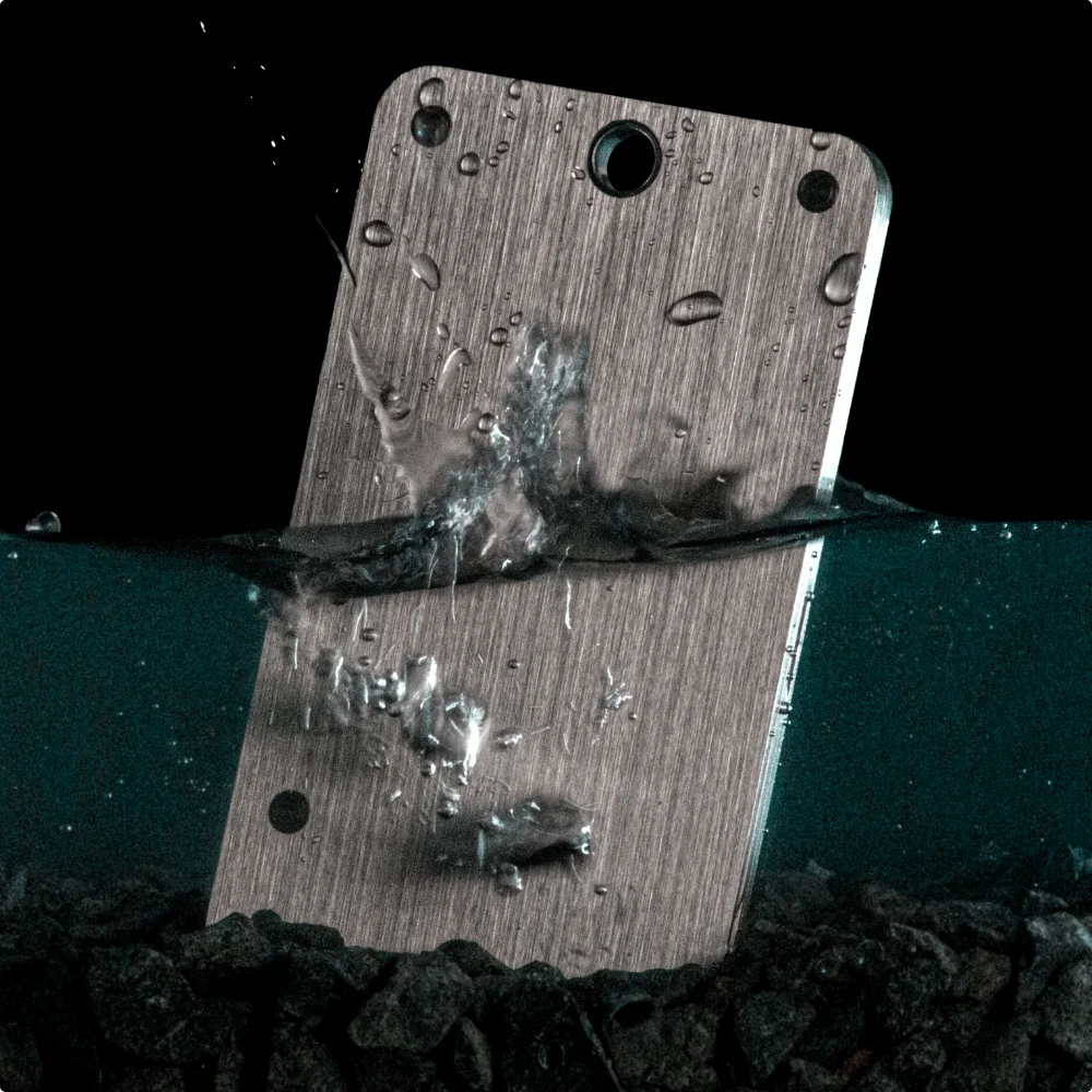 Billfodl stainless steel seed phrase backup half submerged in water