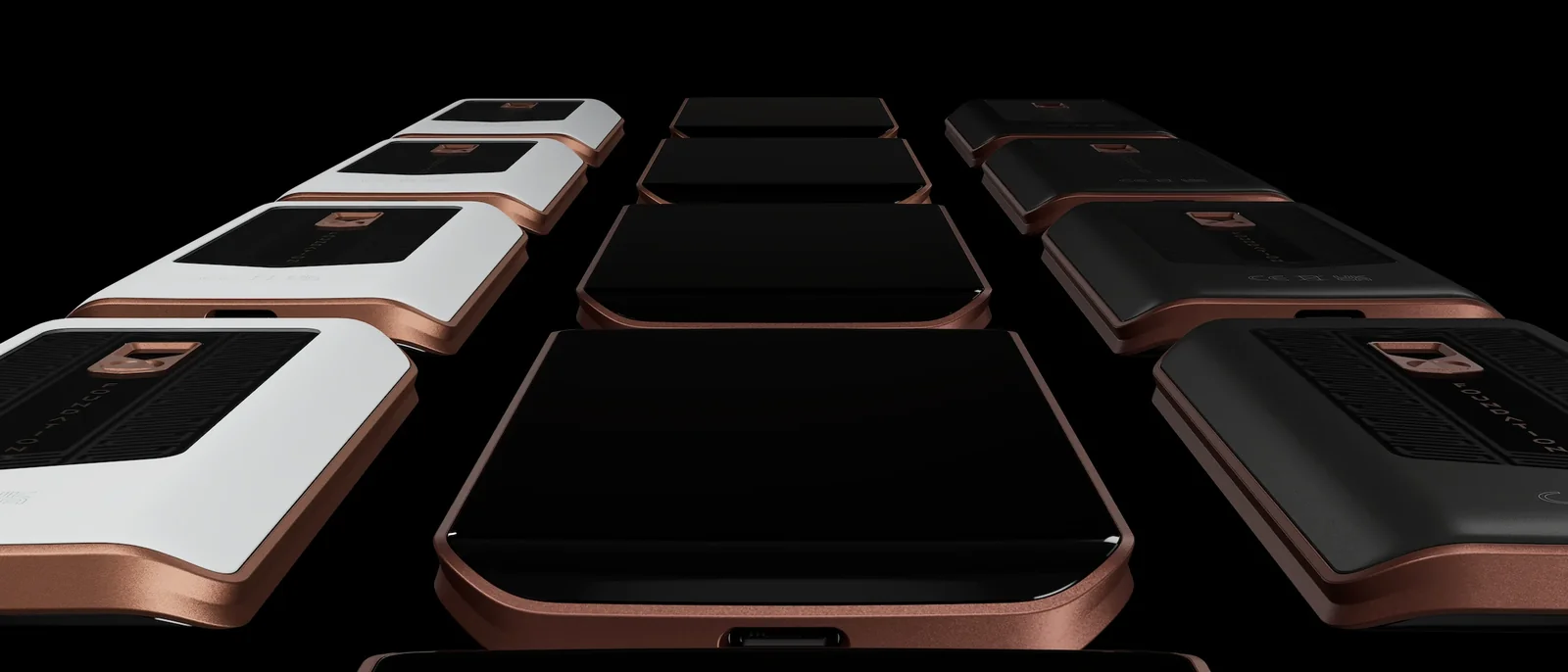Several Foundation Passport Prime devices arranged in rows, showing both colorways and the rear camera