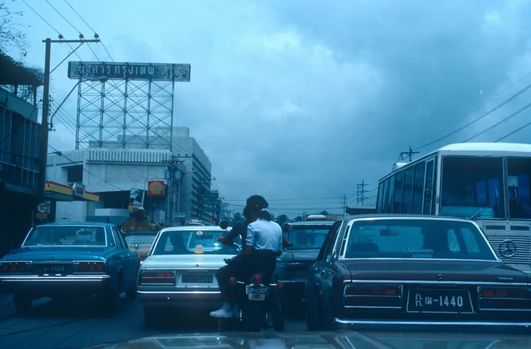 Cars and a motorbike stuck in a traffic jam, a picture of a stuck Ethereum transaction waiting in the mempool