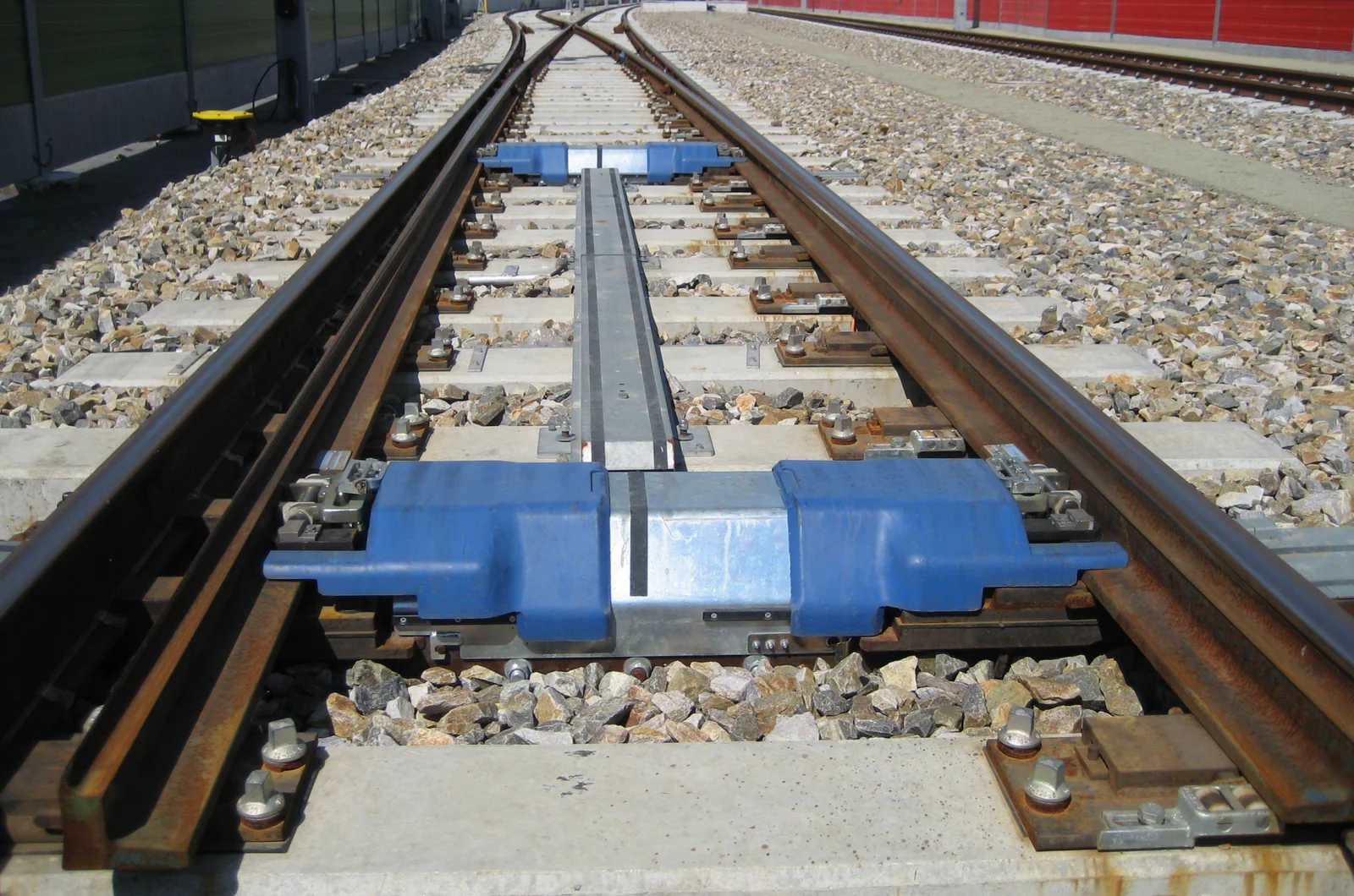 Railroad switch where one track splits into two, illustrating how to choose the right network when sending crypto
