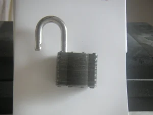 An open steel padlock on a white background, standing for a token approval left open until you revoke it