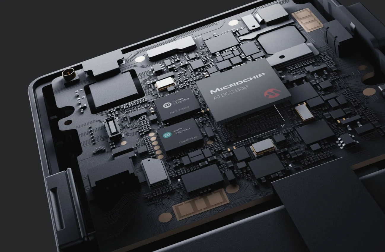 Cutaway render of the Keystone 3 Pro board showing the Microchip ATECC608 and Maxim MAX32520 and DS28S60 secure element chips