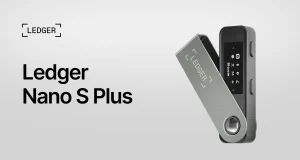 Ledger Nano S Plus hardware wallet in silver, shown open with its OLED screen lit, on a light background