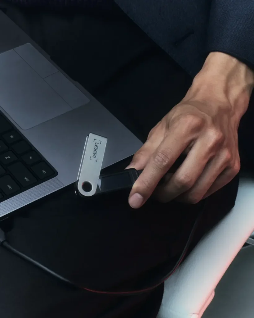 Ledger Nano S Plus plugged into a laptop
