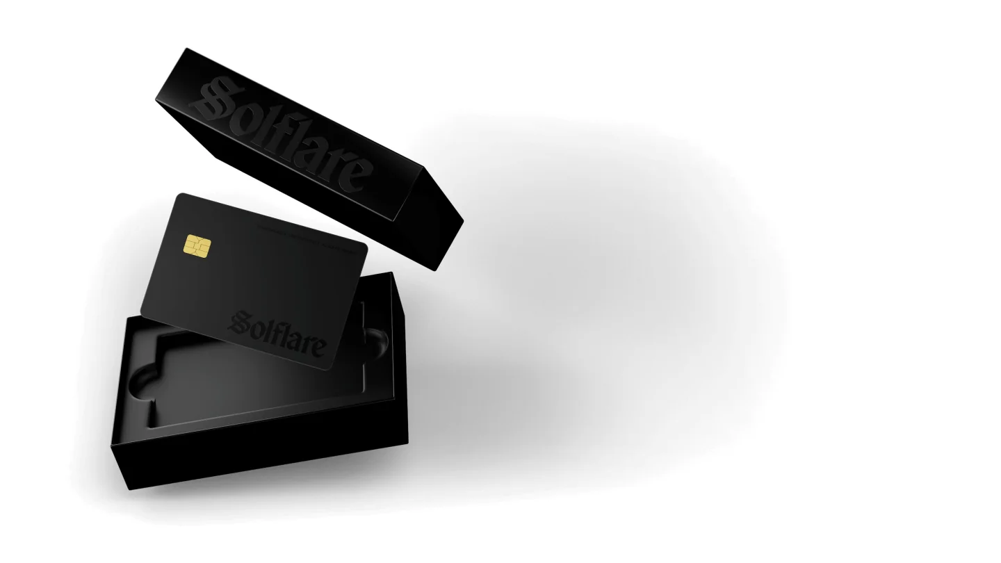 Solflare Shield hardware wallet card lifted out of its black Solflare box