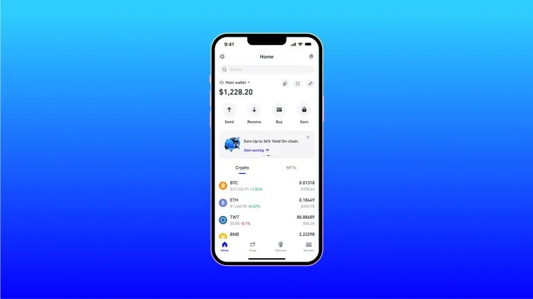 Trust Wallet mobile app home screen showing balance, Send, Receive, Buy and Earn buttons
