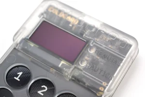 Close-up of a Coldcard hardware wallet keypad and screen, the kind of device keypad used to type a BIP-39 passphrase