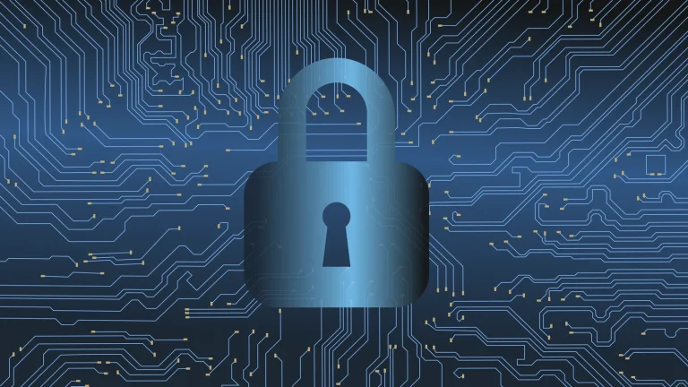 A padlock over a blue circuit board pattern, illustrating what a wallet drainer is and how to avoid one